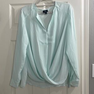 Light Mint green blouse. Size large. Very flattering and Forgiving.